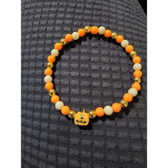Handmade Orange and White Halloween Stretch Bracelet with Pumpkin - Picture 6 of 11